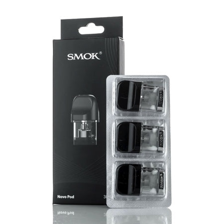 Smok - Novo - Replacement Pods - 1.2ohm tall back box with strip of 3 pods standing beside it.